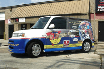 Installation of vehicle wrap in Metairie Louisiana for Todd’s Technology
